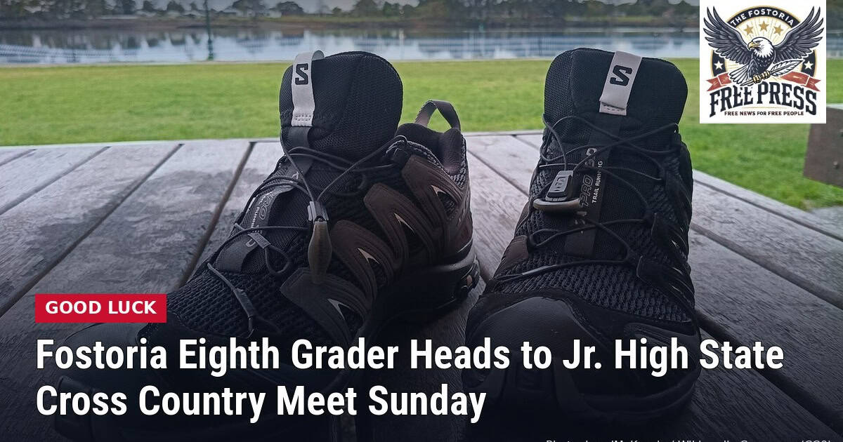 Fostoria News: a pair of trail running shoes on a wooden deck beside a park lawn, with the headline: Fostoria Eighth Grader Heads to Jr. High State Cross Country Meet Sunday